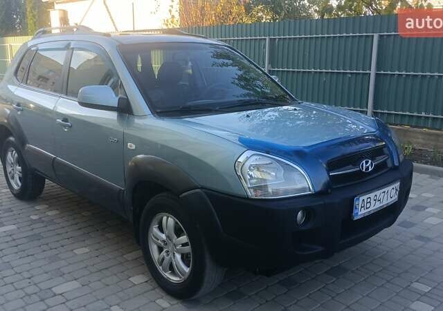 Синий Хендай Туксон, объемом двигателя 1.98 л и пробегом 183 тыс. км за 6700 $, фото 1 на Automoto.ua