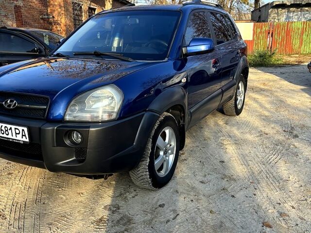 Синий Хендай Туксон, объемом двигателя 2 л и пробегом 208 тыс. км за 6700 $, фото 1 на Automoto.ua