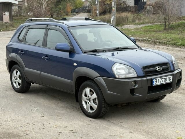 Синий Хендай Туксон, объемом двигателя 2 л и пробегом 279 тыс. км за 6280 $, фото 1 на Automoto.ua