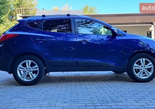 Хендай Туксон 2012 у Кривому Розі на Automoto.ua Синій Хендай Туксон, об'ємом двигуна 2.4 л та пробігом 114 тис. км за 10600 $, фото 1 на Automoto.ua
