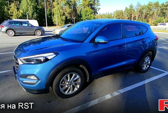 Синий Хендай Туксон, объемом двигателя 2 л и пробегом 112 тыс. км за 17200 $, фото 1 на Automoto.ua