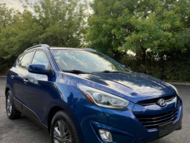 Синий Хендай Туксон, объемом двигателя 2.4 л и пробегом 76 тыс. км за 9600 $, фото 1 на Automoto.ua