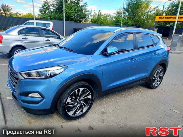 Синий Хендай Туксон, объемом двигателя 2 л и пробегом 198 тыс. км за 15700 $, фото 1 на Automoto.ua