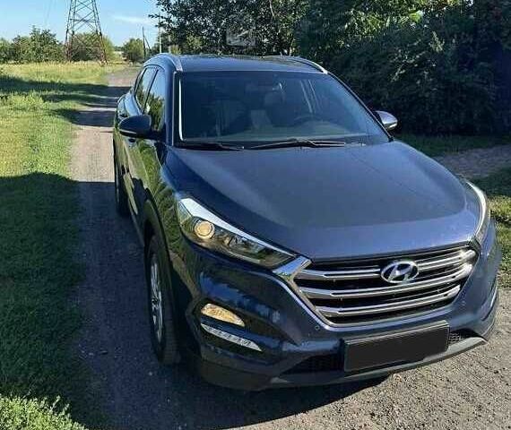 Синій Хендай Туксон, об'ємом двигуна 2 л та пробігом 90 тис. км за 19500 $, фото 1 на Automoto.ua