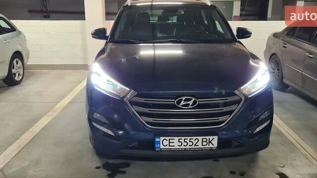 Синий Хендай Туксон, объемом двигателя 2 л и пробегом 150 тыс. км за 23500 $, фото 1 на Automoto.ua