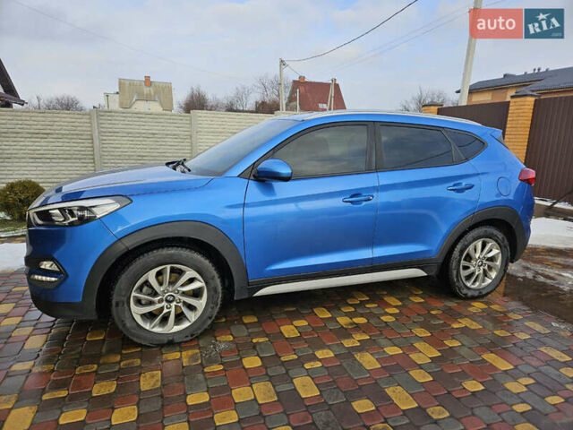 Синий Хендай Туксон, объемом двигателя 2 л и пробегом 150 тыс. км за 17999 $, фото 1 на Automoto.ua