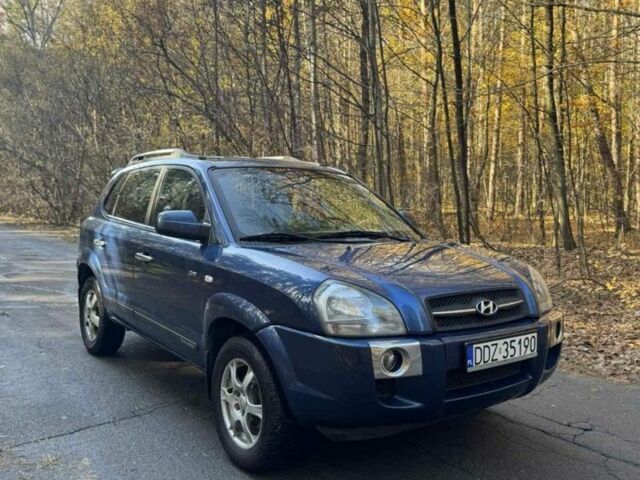 Синий Хендай Туксон, объемом двигателя 2.4 л и пробегом 120 тыс. км за 2800 $, фото 1 на Automoto.ua
