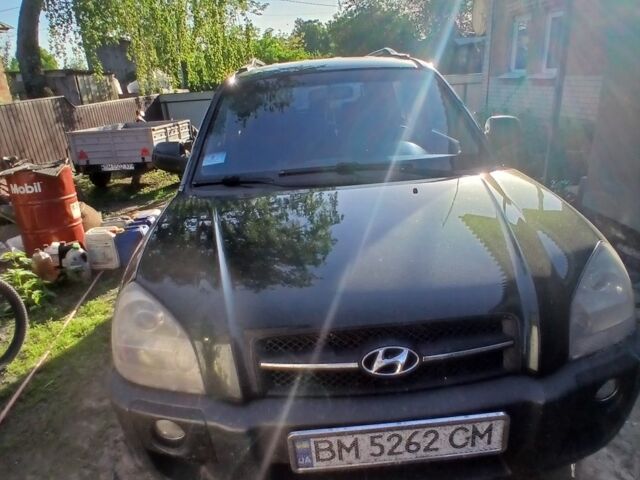 Зеленый Хендай Туксон, объемом двигателя 2 л и пробегом 250 тыс. км за 8500 $, фото 1 на Automoto.ua