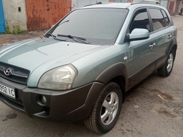 Зелений Хендай Туксон, об'ємом двигуна 2 л та пробігом 275 тис. км за 7450 $, фото 1 на Automoto.ua