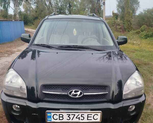 Зеленый Хендай Туксон, объемом двигателя 1.98 л и пробегом 310 тыс. км за 6200 $, фото 1 на Automoto.ua