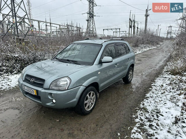 Зелений Хендай Туксон, об'ємом двигуна 2 л та пробігом 248 тис. км за 6999 $, фото 1 на Automoto.ua