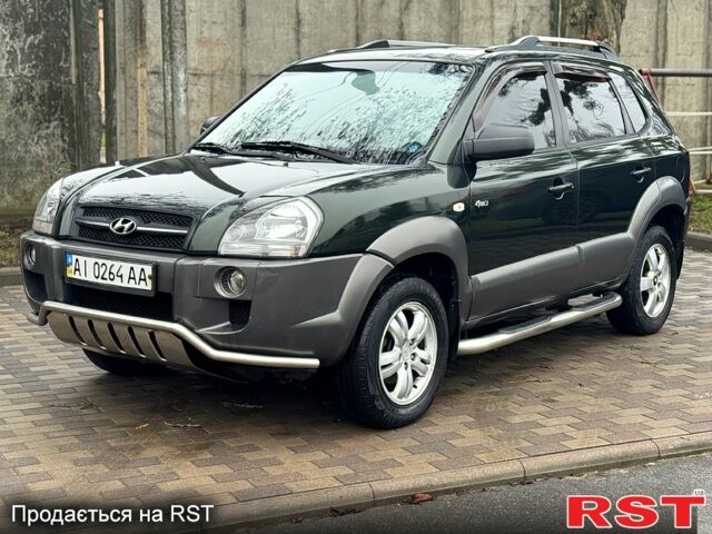 Зелений Хендай Туксон, об'ємом двигуна 2 л та пробігом 245 тис. км за 7500 $, фото 1 на Automoto.ua