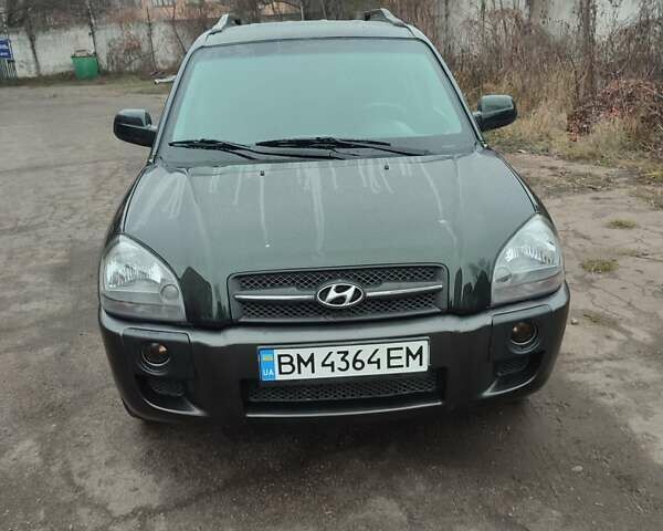 Зеленый Хендай Туксон, объемом двигателя 2 л и пробегом 213 тыс. км за 6500 $, фото 1 на Automoto.ua