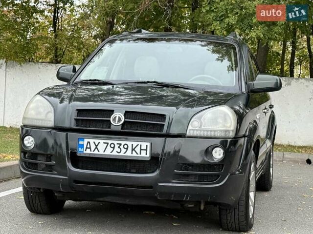 Зеленый Хендай Туксон, объемом двигателя 2.66 л и пробегом 313 тыс. км за 6500 $, фото 1 на Automoto.ua