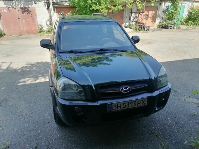 Зеленый Хендай Туксон, объемом двигателя 2 л и пробегом 184 тыс. км за 7700 $, фото 1 на Automoto.ua