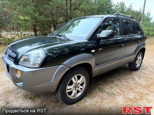 Зеленый Хендай Туксон, объемом двигателя 2 л и пробегом 185 тыс. км за 7950 $, фото 1 на Automoto.ua