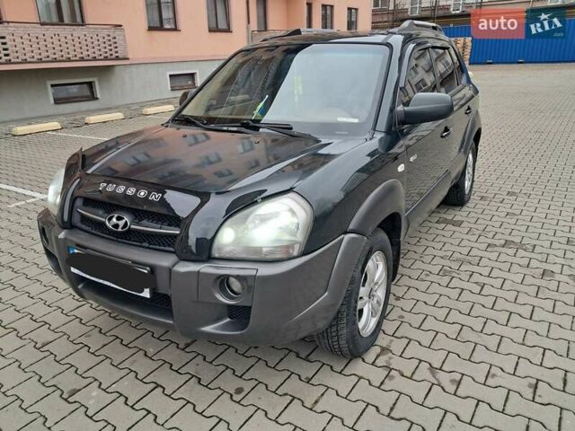 Зеленый Хендай Туксон, объемом двигателя 1.98 л и пробегом 280 тыс. км за 7200 $, фото 1 на Automoto.ua