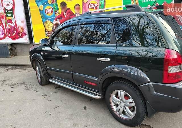 Зелений Хендай Туксон, об'ємом двигуна 1.98 л та пробігом 245 тис. км за 7800 $, фото 1 на Automoto.ua