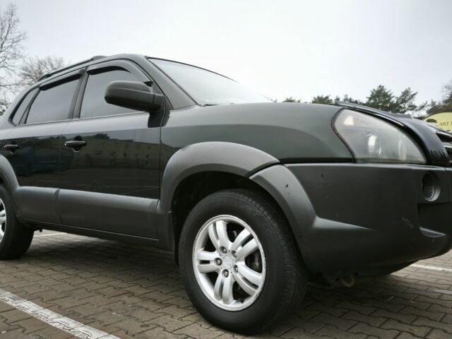 Зеленый Хендай Туксон, объемом двигателя 2 л и пробегом 275 тыс. км за 7999 $, фото 1 на Automoto.ua