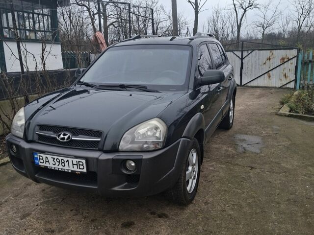 Зеленый Хендай Туксон, объемом двигателя 2 л и пробегом 228 тыс. км за 6500 $, фото 1 на Automoto.ua