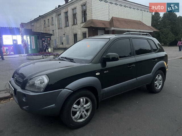 Зеленый Хендай Туксон, объемом двигателя 1.98 л и пробегом 219 тыс. км за 8350 $, фото 1 на Automoto.ua