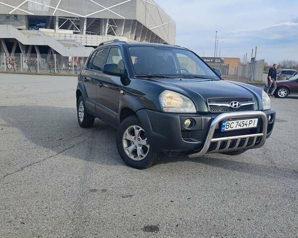 Зеленый Хендай Туксон, объемом двигателя 1.98 л и пробегом 220 тыс. км за 6800 $, фото 1 на Automoto.ua