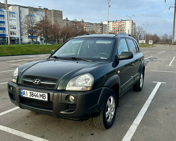 Зелений Хендай Туксон, об'ємом двигуна 1.98 л та пробігом 156 тис. км за 7999 $, фото 1 на Automoto.ua