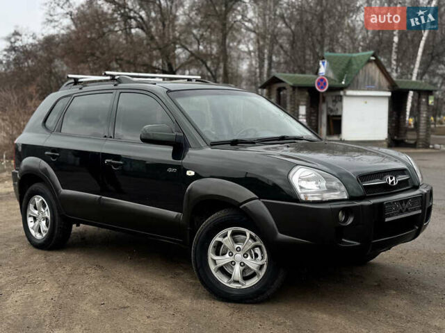 Зеленый Хендай Туксон, объемом двигателя 2 л и пробегом 170 тыс. км за 7999 $, фото 1 на Automoto.ua