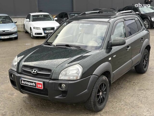 Зеленый Хендай Туксон, объемом двигателя 2 л и пробегом 234 тыс. км за 4500 $, фото 1 на Automoto.ua