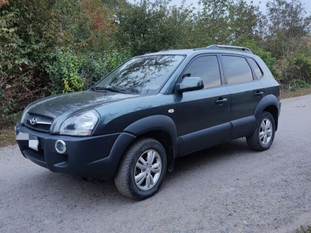 Зеленый Хендай Туксон, объемом двигателя 2 л и пробегом 97 тыс. км за 9600 $, фото 1 на Automoto.ua