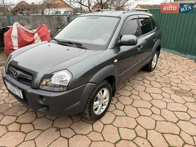 Зелений Хендай Туксон, об'ємом двигуна 2 л та пробігом 65 тис. км за 12250 $, фото 1 на Automoto.ua