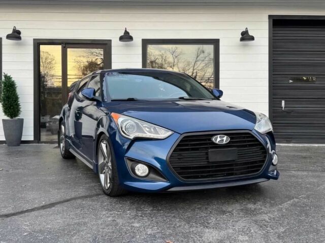 Синий Хендай Велостер, объемом двигателя 1.6 л и пробегом 77 тыс. км за 5400 $, фото 1 на Automoto.ua