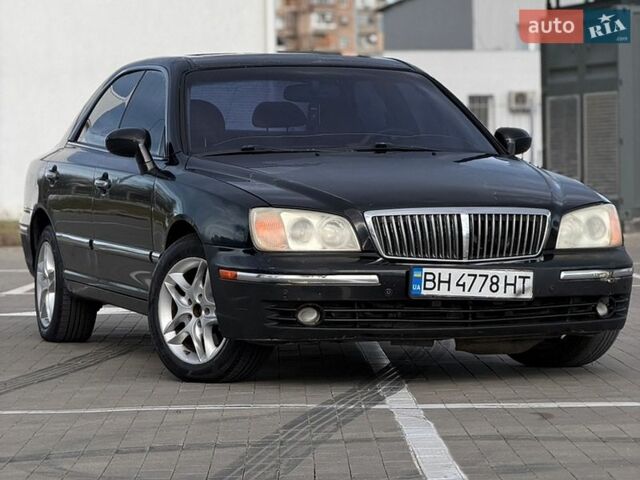 Черный Хендай КСГ, объемом двигателя 3.5 л и пробегом 150 тыс. км за 2799 $, фото 1 на Automoto.ua