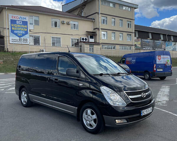 Черный Хендай H-1, объемом двигателя 2.5 л и пробегом 220 тыс. км за 14900 $, фото 1 на Automoto.ua