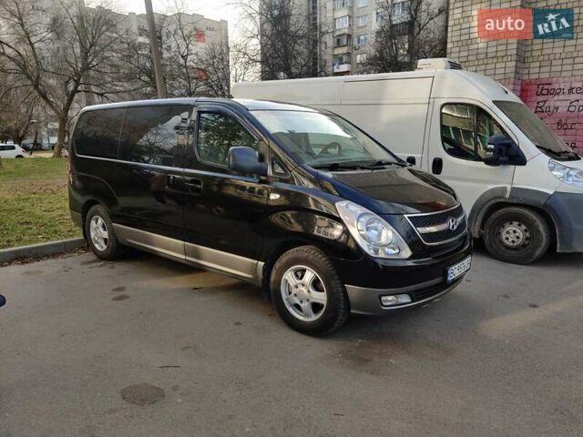 Черный Хендай H-1, объемом двигателя 2.5 л и пробегом 229 тыс. км за 11700 $, фото 1 на Automoto.ua