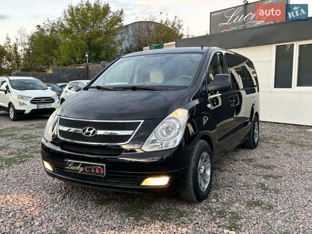 Черный Хендай H-1, объемом двигателя 2.5 л и пробегом 268 тыс. км за 12800 $, фото 1 на Automoto.ua