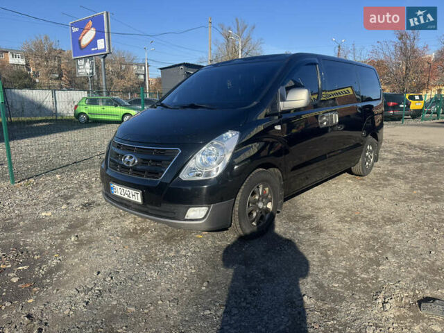 Черный Хендай H-1, объемом двигателя 2.5 л и пробегом 295 тыс. км за 15500 $, фото 1 на Automoto.ua