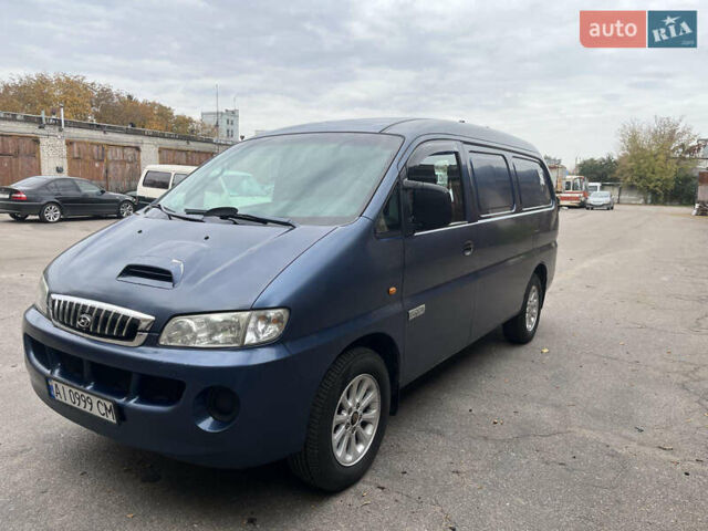 Синий Хендай H-1, объемом двигателя 2.5 л и пробегом 353 тыс. км за 5700 $, фото 1 на Automoto.ua