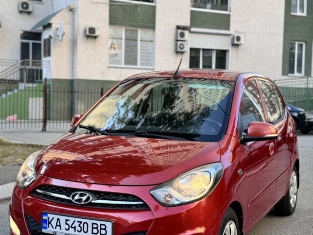Красный Хендай и10, объемом двигателя 1.25 л и пробегом 75 тыс. км за 6999 $, фото 1 на Automoto.ua