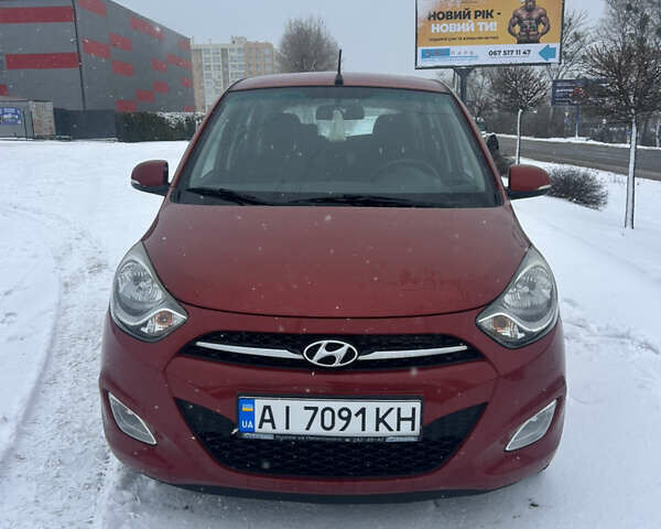 Красный Хендай и10, объемом двигателя 1.25 л и пробегом 105 тыс. км за 6900 $, фото 1 на Automoto.ua