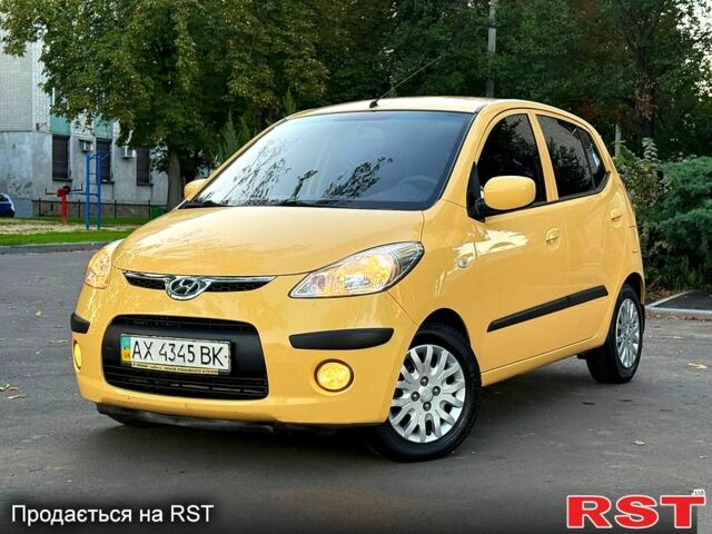 Желтый Хендай и10, объемом двигателя 1.1 л и пробегом 125 тыс. км за 6500 $, фото 1 на Automoto.ua