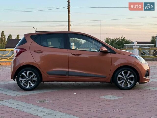 Помаранчевий Хендай і10, об'ємом двигуна 1.2 л та пробігом 150 тис. км за 7999 $, фото 1 на Automoto.ua