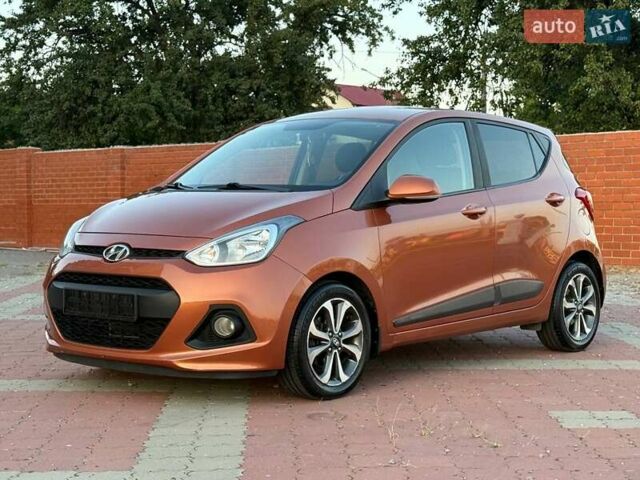 Помаранчевий Хендай і10, об'ємом двигуна 1.25 л та пробігом 150 тис. км за 7999 $, фото 1 на Automoto.ua