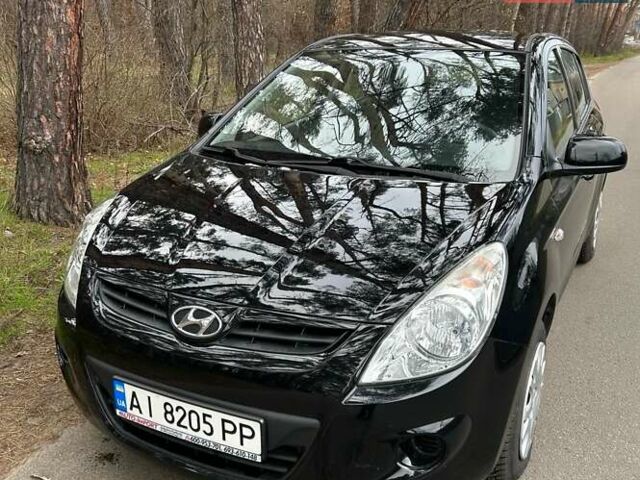 Черный Хендай и20, объемом двигателя 1.25 л и пробегом 118 тыс. км за 5700 $, фото 1 на Automoto.ua