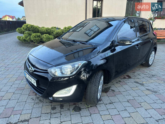 Черный Хендай и20, объемом двигателя 1.12 л и пробегом 298 тыс. км за 4999 $, фото 1 на Automoto.ua