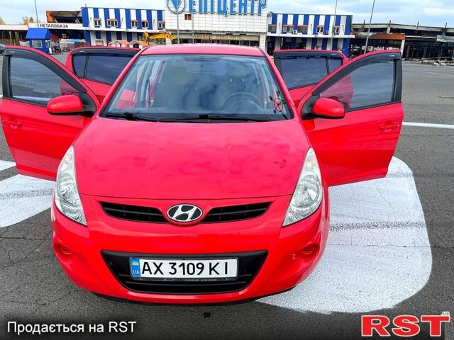 Червоний Хендай і20, об'ємом двигуна 1.2 л та пробігом 163 тис. км за 4800 $, фото 1 на Automoto.ua