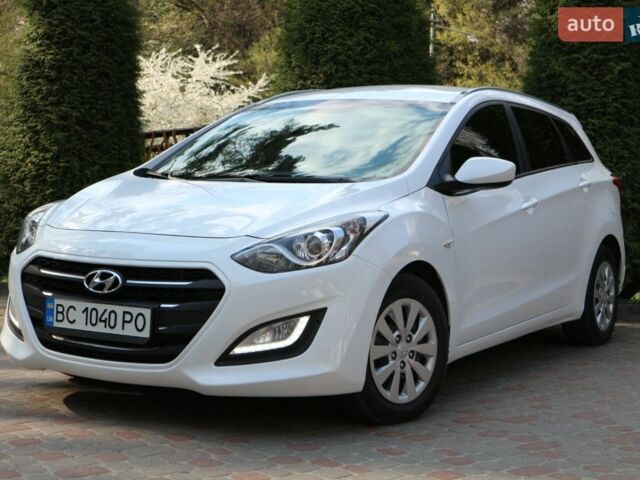 Белый Хендай i30, объемом двигателя 1.58 л и пробегом 215 тыс. км за 8100 $, фото 1 на Automoto.ua