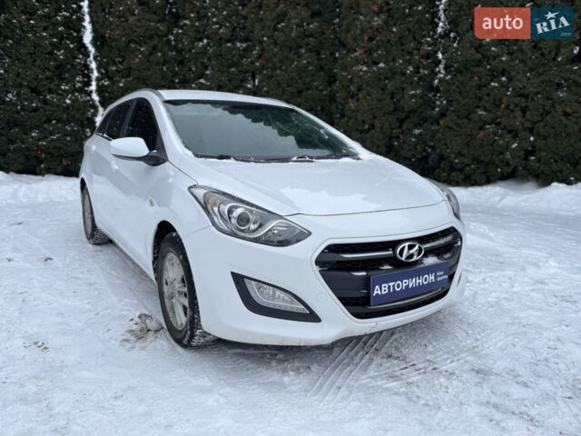 Белый Хендай i30, объемом двигателя 1.58 л и пробегом 207 тыс. км за 9000 $, фото 1 на Automoto.ua
