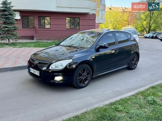 Черный Хендай i30, объемом двигателя 1.6 л и пробегом 339 тыс. км за 4450 $, фото 1 на Automoto.ua
