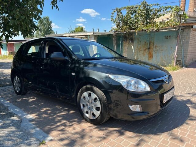 Черный Хендай i30, объемом двигателя 1.4 л и пробегом 236 тыс. км за 4905 $, фото 1 на Automoto.ua